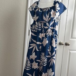 An adorable silk romper with tropical flair great for cruising